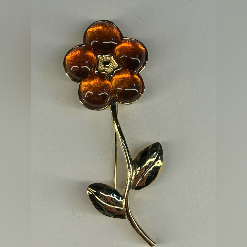 007. Gold-Tone amber colored Flower Brooch